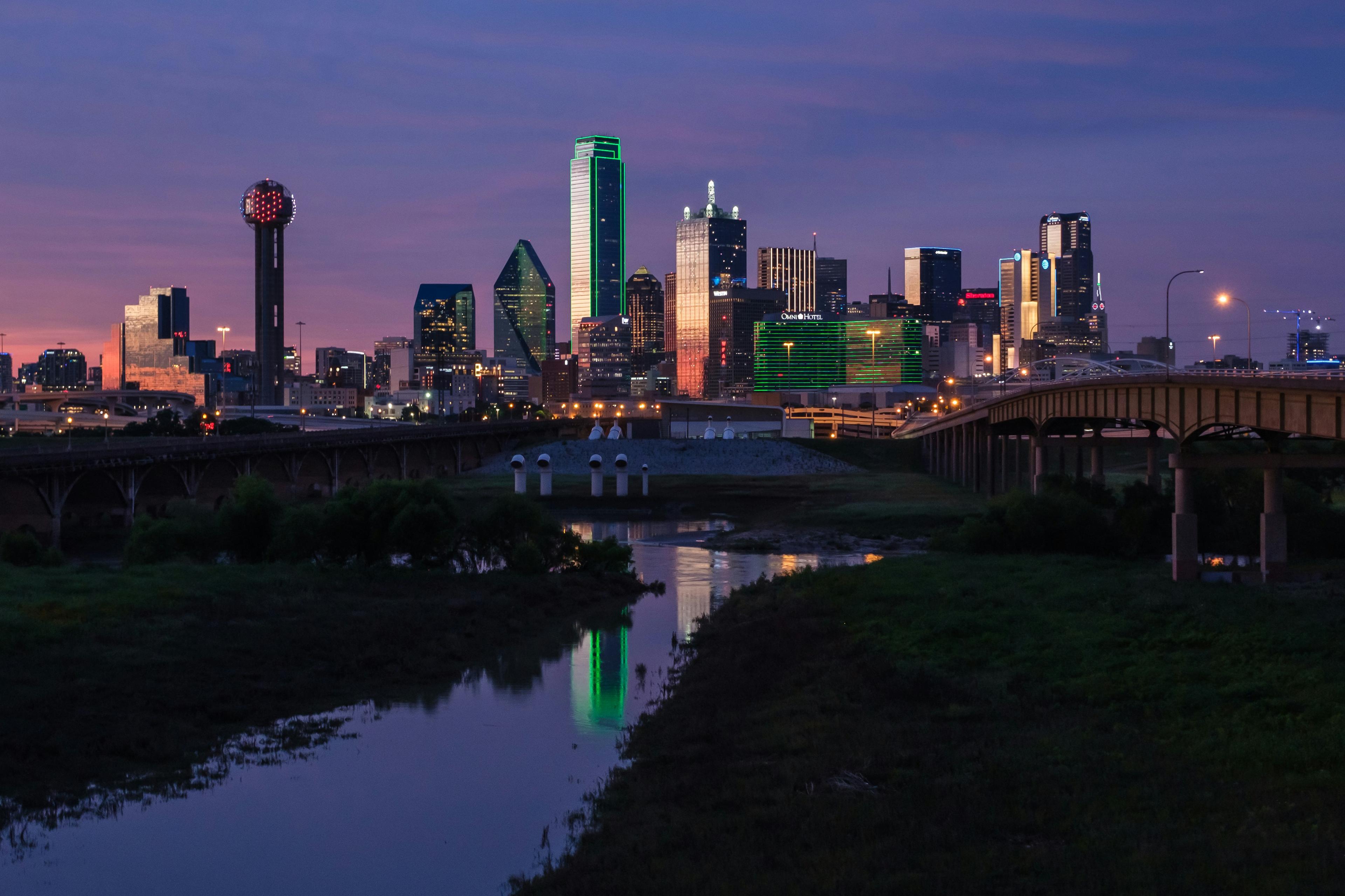 Dallas-Fort Worth skyline at sunset showcasing the vibrant real estate market